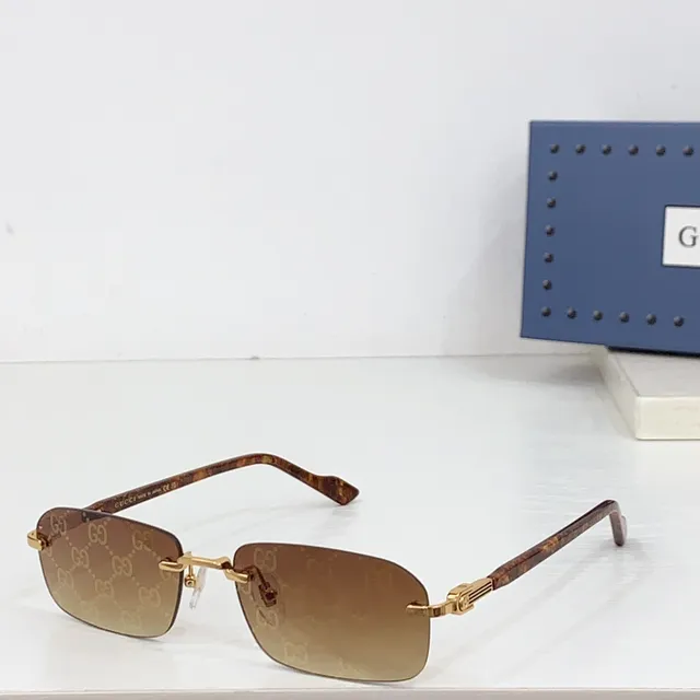 Gucci بدون إطار مستطيل ذهبي ماربل أسيتات نظارات بصرية 9