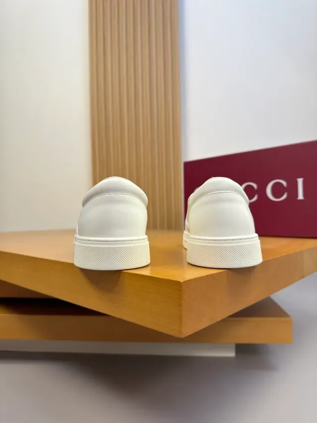 Gucci White Slip-On Embossed GG Monogram Lifestyle Sneakers 3