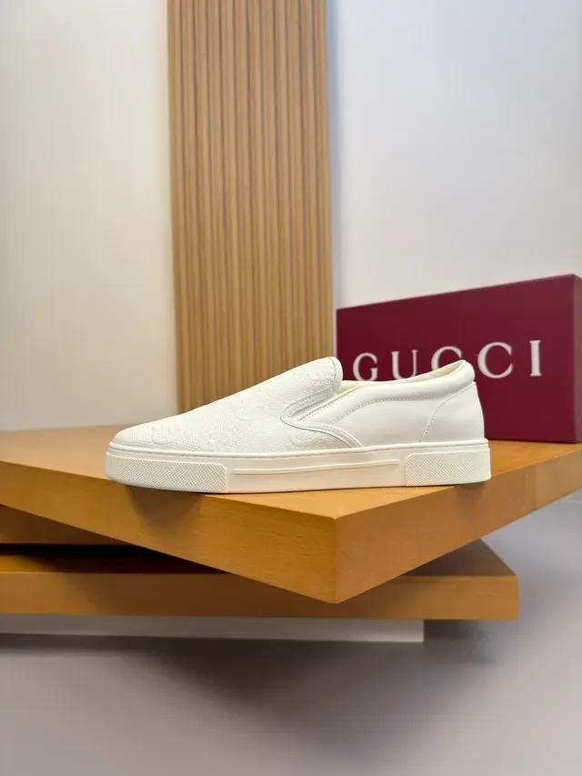 Gucci White Slip-On Embossed GG Monogram Lifestyle Sneakers 4