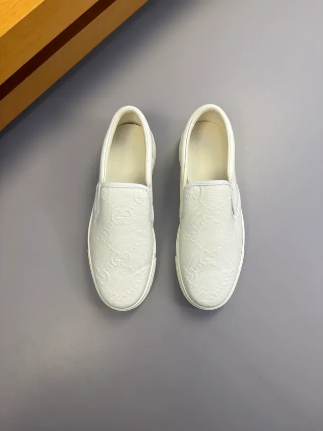 Gucci White Slip-On Embossed GG Monogram Lifestyle Sneakers 5