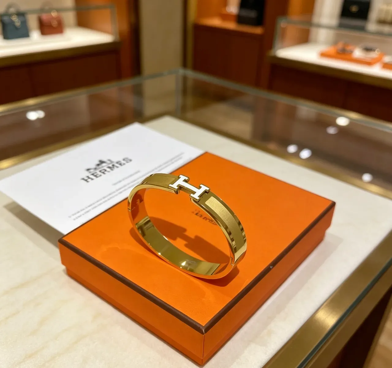 Hermès Clic H Gold White Rigid Bangle Enamel-Accented Clasp Bracelet 9