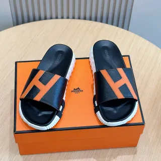 Hermès Oran Slide أسود وبرتقالي جلدي