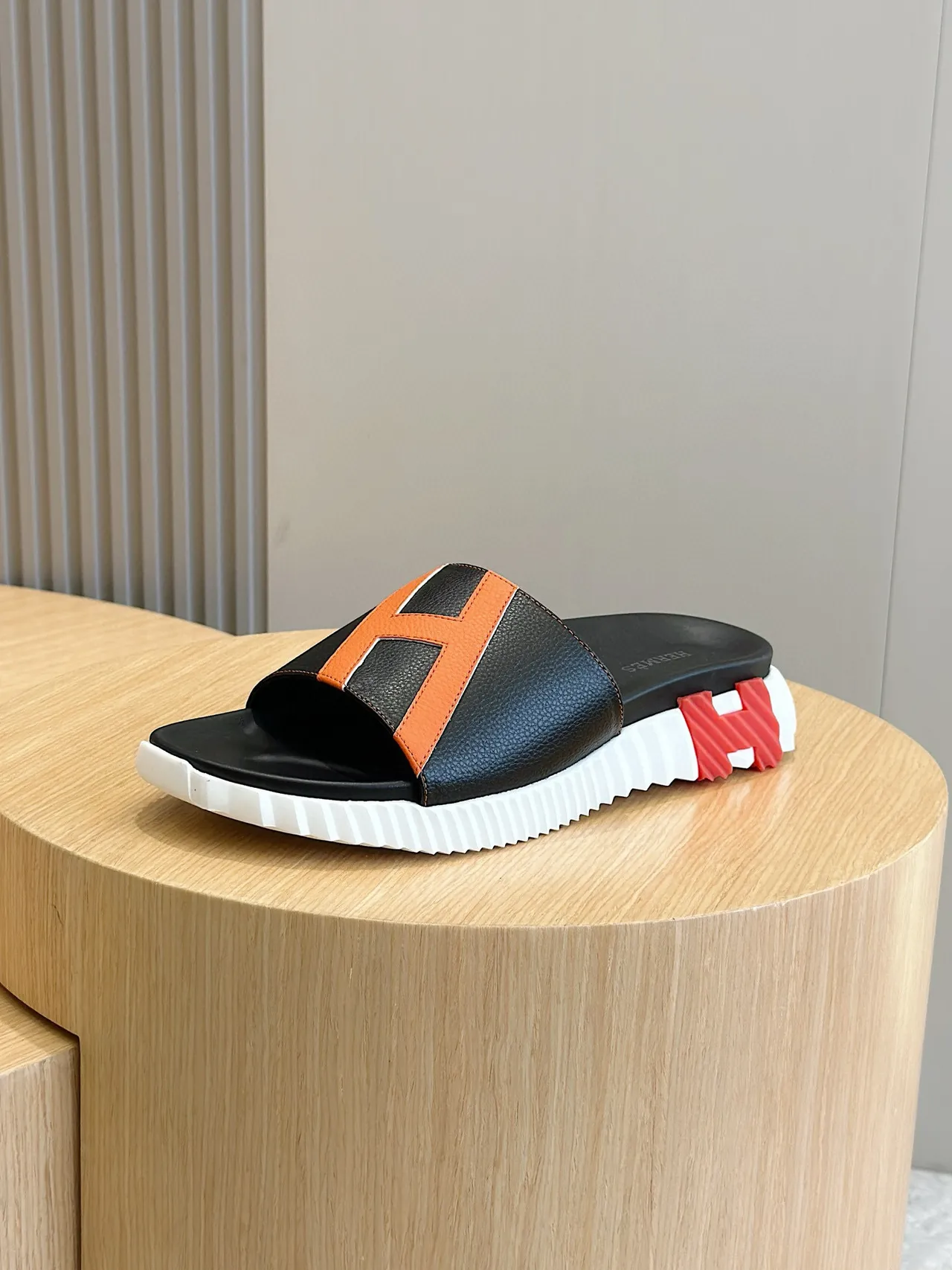 Hermès Oran Slide Black and Orange Leather Slippers 2