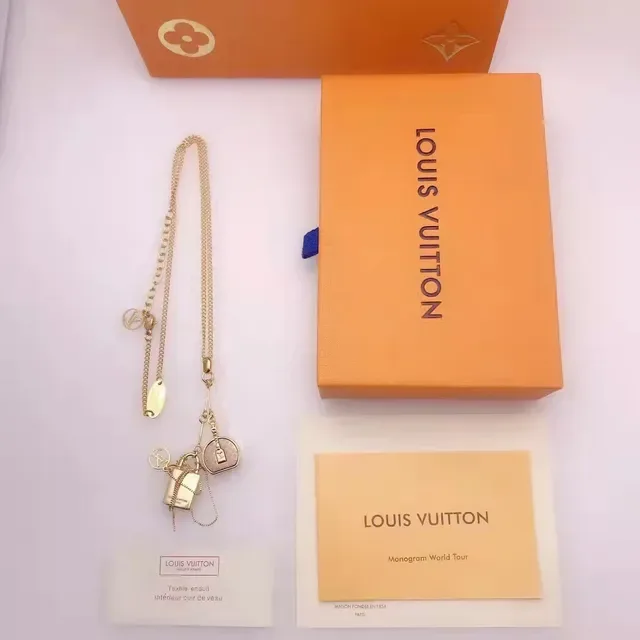 Louis Vuitton Asymmetrical Lock and Chain LV Monogram Earrings 6