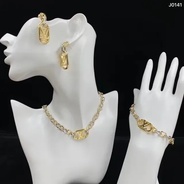 Louis Vuitton Gold Silver Metal Openwork LV Monogram Earrings 2