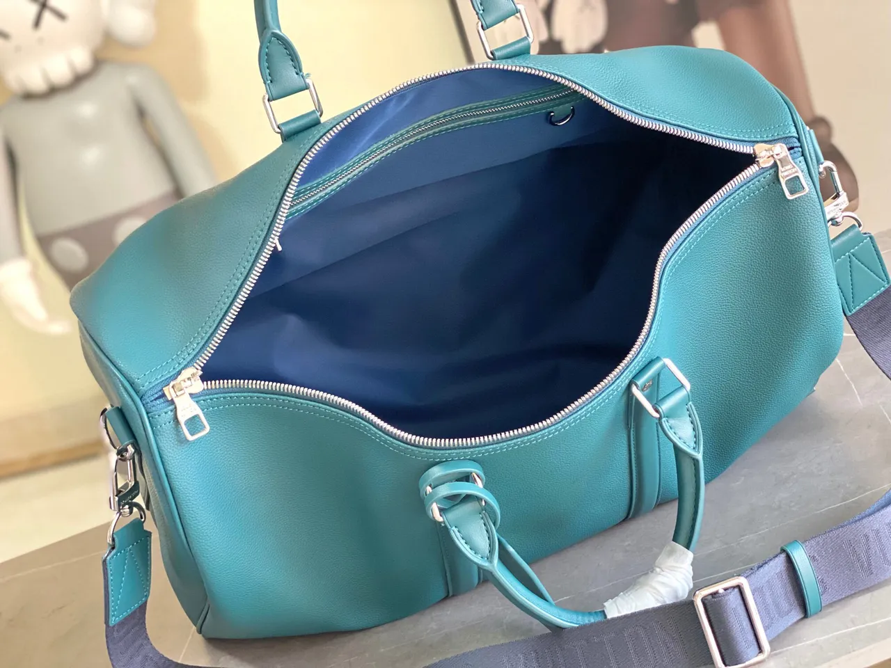 Louis Vuitton Keepall Bandoulière Turquoise Grained Leather Duffle Bag 2