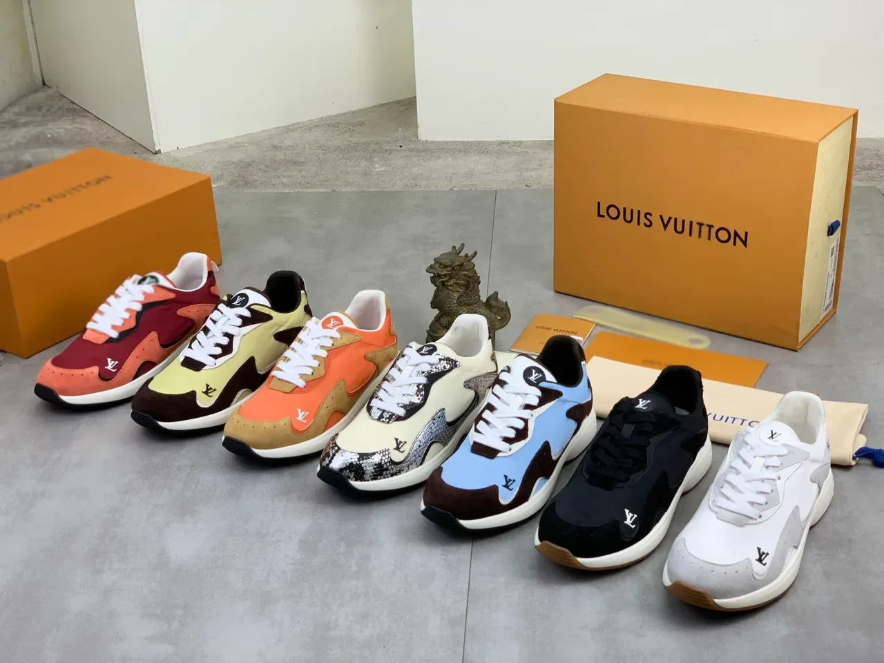 Louis Vuitton LV Trainer Beige Silver Asymmetrical Snake-Embossed Panels Monogram Branding Lifestyle Sneakers 2
