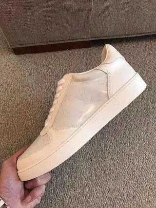 Louis Vuitton LV Trainer White Monogram-Coated Leather Circular Embossed Medallion Lifestyle Sneakers 4