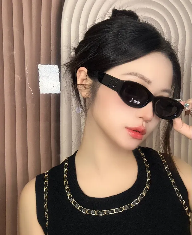 Miu Miu 粉色猫眼椭圆形太阳镜 2