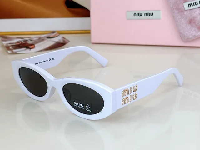 Miu Miu 粉色猫眼椭圆形太阳镜 5