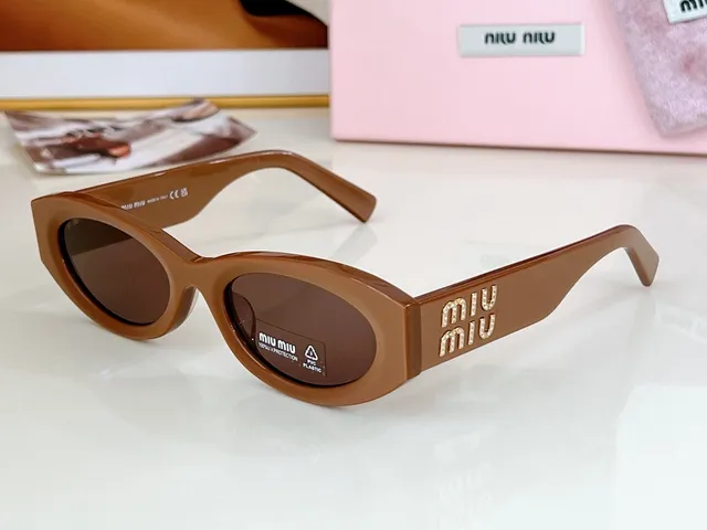 Miu Miu 粉色猫眼椭圆形太阳镜 7