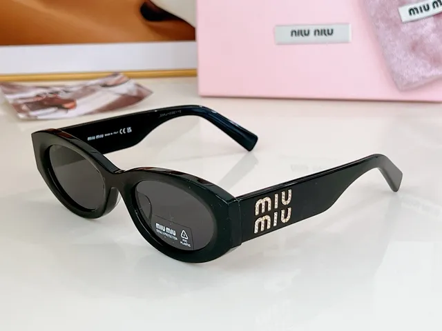 Miu Miu 粉色猫眼椭圆形太阳镜 8