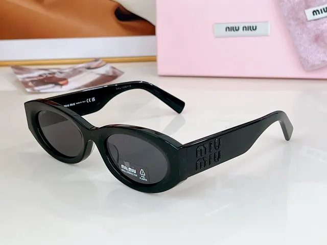 Miu Miu 粉色猫眼椭圆形太阳镜 9