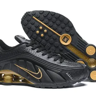 Nike Chaussures Lifestyle Noires et Dorées en Cuir Perforé avec Cushioning Shox Column