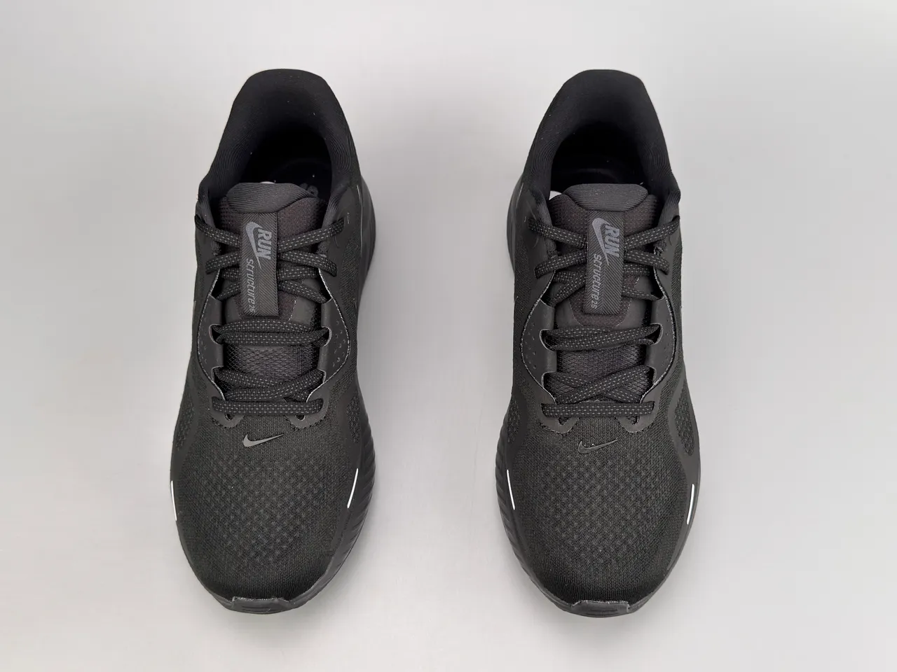 Nike chaussures de course en maille monocromatique noire 9