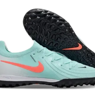 Chaussures de football Nike bleu et orange avec upper en knit et semelle turf