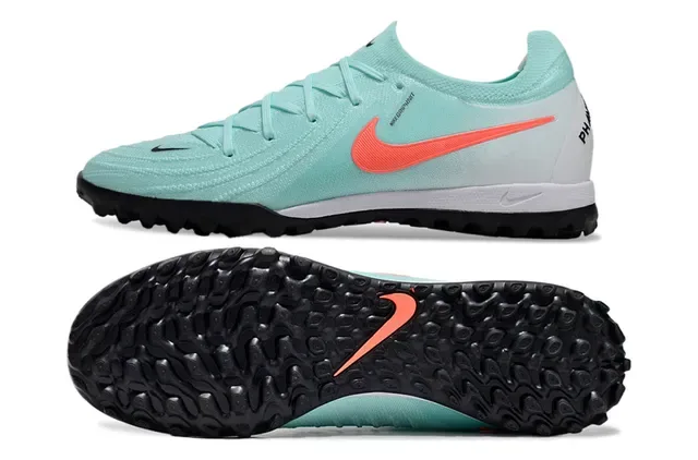 Chuteiras Nike azul e laranja com upper de knit e sola turf 5