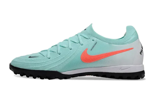 Chuteiras Nike azul e laranja com upper de knit e sola turf 8