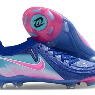 Nike Phantom GT Chaussures de football avec upper de knit bleu rose, lacets asymétriques et surface Firm-Ground