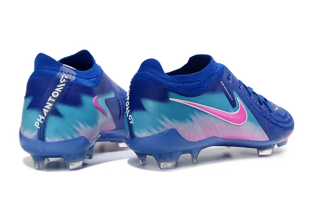 Nike Phantom GT Chaussures de football avec upper de knit bleu rose, lacets asymétriques et surface Firm-Ground 5