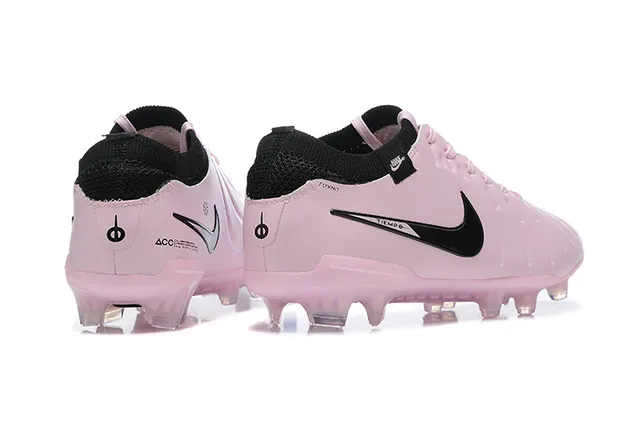 Nike Zapatos de fútbol rosa y negro de corte bajo con upper sintético acolchado con textura ribeteada para terreno firme 2