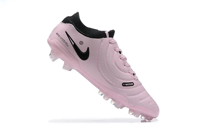 Nike Zapatos de fútbol rosa y negro de corte bajo con upper sintético acolchado con textura ribeteada para terreno firme 4