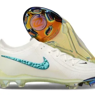 Nike Chuteira branca e azul low-cut com upper de malha Swoosh turquesa faceted superfície firme