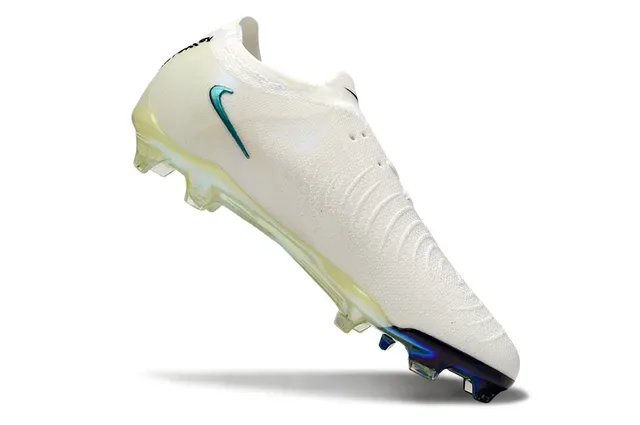 Nike Chuteira branca e azul low-cut com upper de malha Swoosh turquesa faceted superfície firme 2