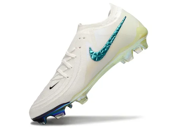 Nike Chuteira branca e azul low-cut com upper de malha Swoosh turquesa faceted superfície firme 3