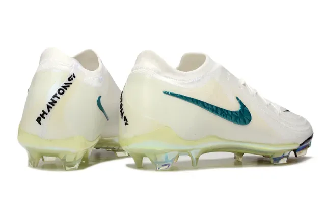 Nike Chuteira branca e azul low-cut com upper de malha Swoosh turquesa faceted superfície firme 5