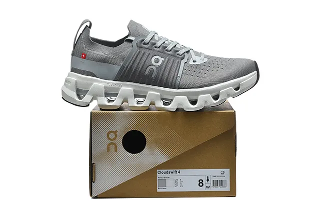 On Chaussure de course gris en tricot 2