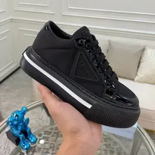 Prada Cloudbust काला सफेद प्लेटफॉर्म सोल मिक्स्ड मैट/ग्लॉसी अपर लाइफस्टाइल स्नीकर