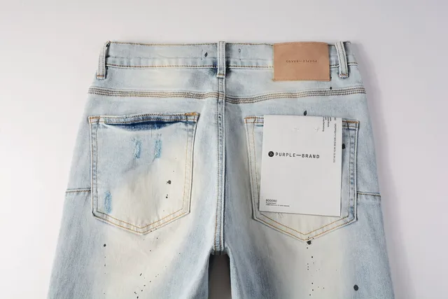 Jeans slim-fit distressed com salpicância de tinta da marca Purple Brand 6
