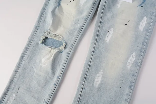 Jeans slim-fit distressed com salpicância de tinta da marca Purple Brand 8