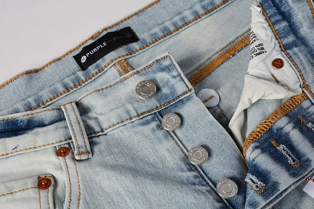 Jeans slim-fit distressed com salpicância de tinta da marca Purple Brand 9