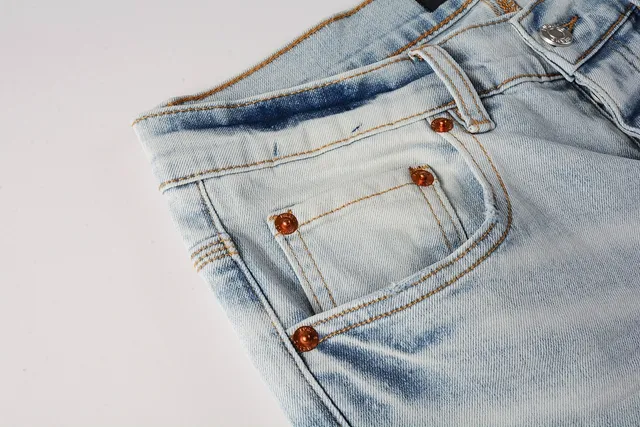 Jeans slim-fit distressed com salpicância de tinta da marca Purple Brand 11