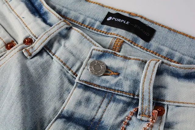 Jeans slim-fit distressed com salpicância de tinta da marca Purple Brand 12