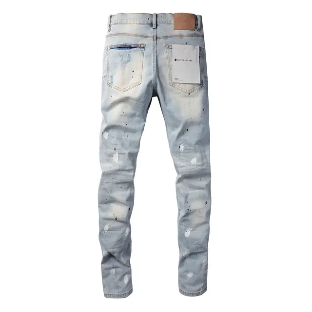 Jeans slim-fit distressed com salpicância de tinta da marca Purple Brand 14