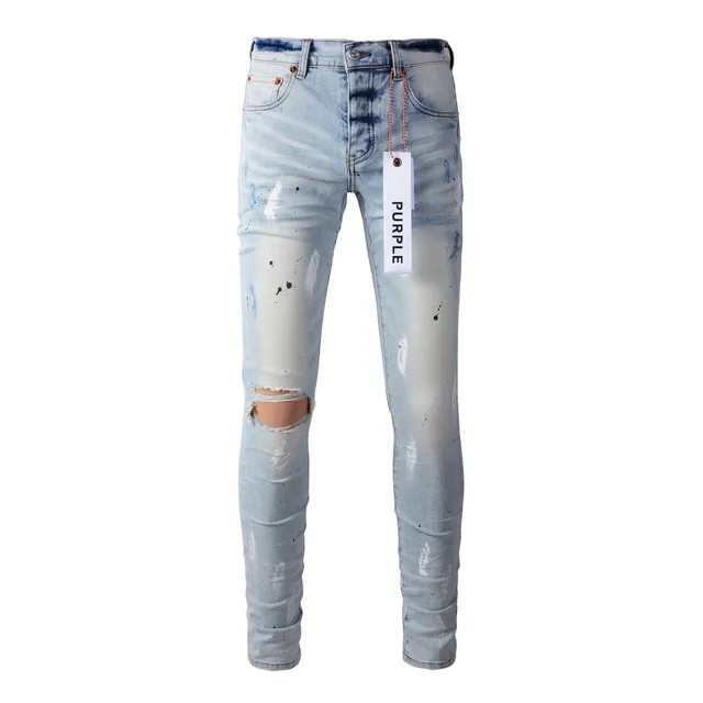 Jeans slim-fit distressed com salpicância de tinta da marca Purple Brand 17