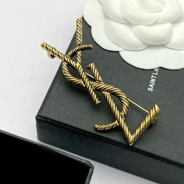 Broche Saint Laurent Monogram Rope doré 6