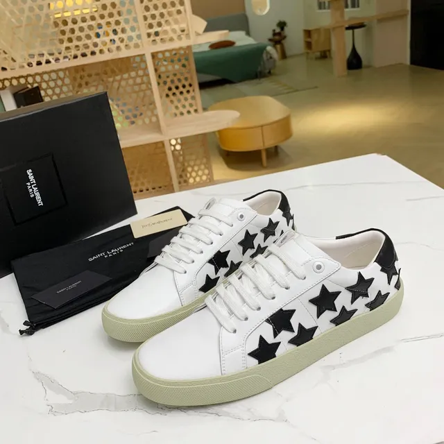 Saint Laurent tênis lifestyle brancos pretos de couro com apliques de estrela 8