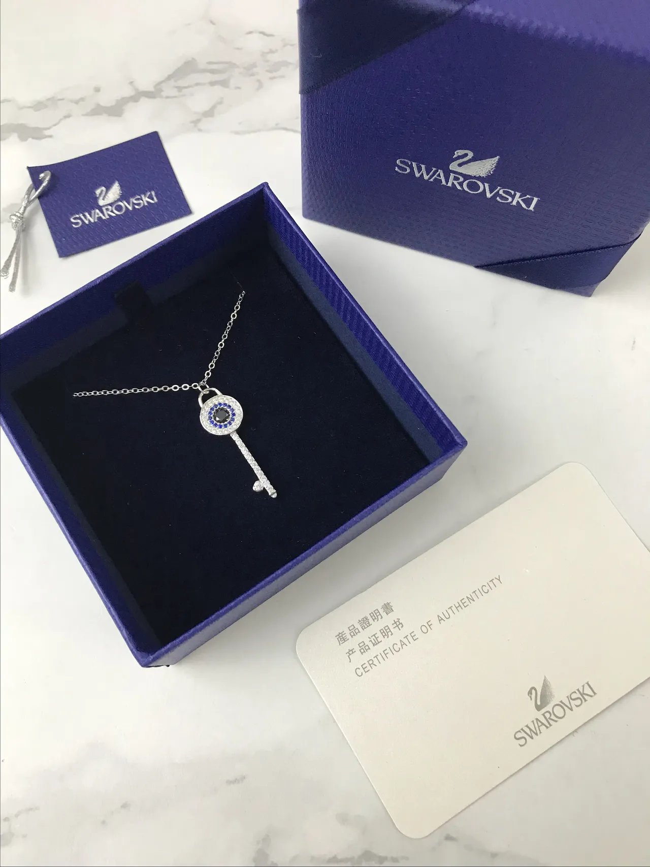 Swarovski colgante de ojo malo en forma de llave 2