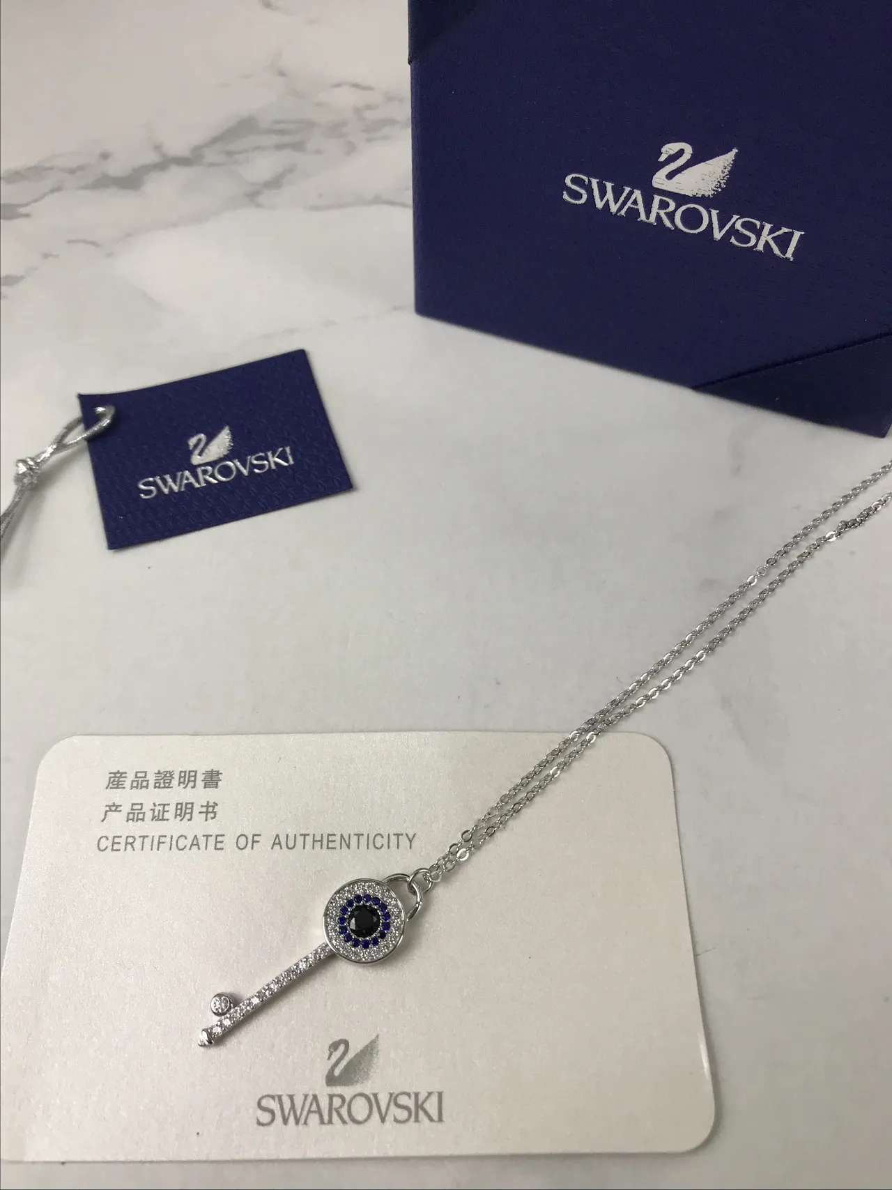 Swarovski colgante de ojo malo en forma de llave 4