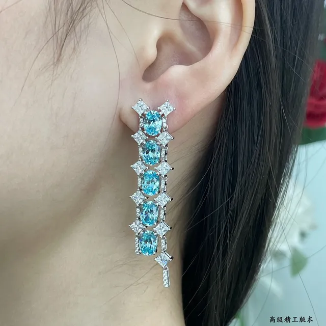 Tiffany & Co. Aretes de plata con cascada vertical de gemas ovaladas azules 9