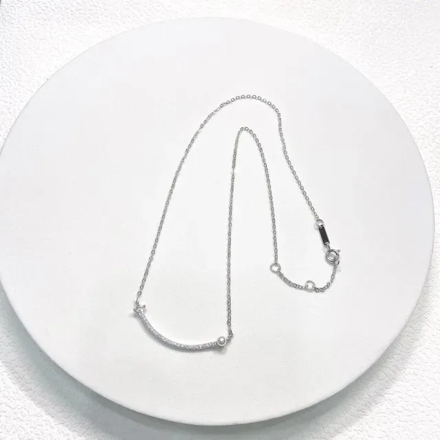 Tiffany & Co. Aretes Barra Curva Perla y Diamantes Pavé 6