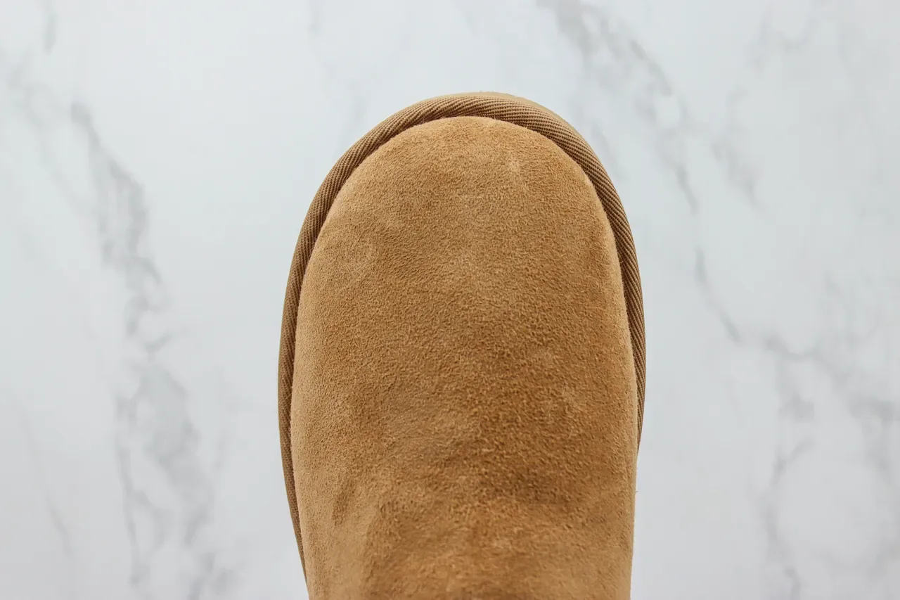 UGG Classic Short चेस्टनट स्यूड शीयरलिंग लाइन स्नो बुटीज 8
