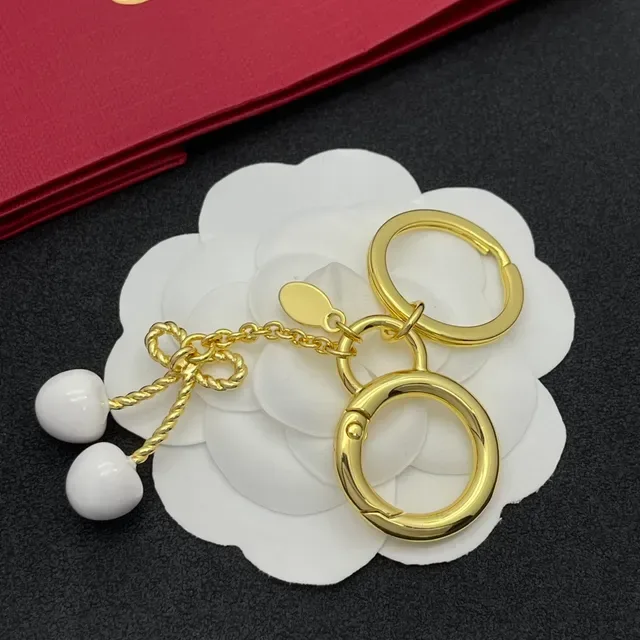 Valentino 樱桃蝴蝶结 金白 金属 陶瓷 樱桃 手链 3