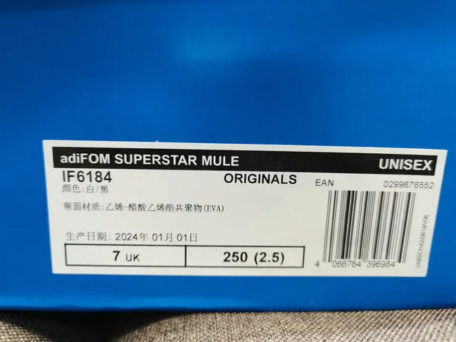 Adidas Adifom Stan Mule blancas y negras con tres rayas mulas 3