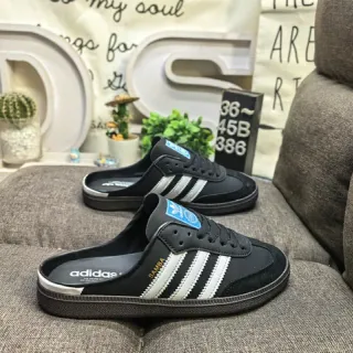 Adidas أحذية كاجوال سوداء وبيضاء مربوط بشرائط ومول لوحة جانبية ثلاث شرائط
