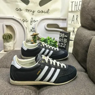 Adidas أحذية رياضية أسلوب حياة سوداء وبيضاء منخفضة جلدية علوية